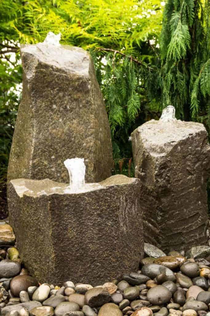 bubbling rock column fountain construction 683x1024 1 | Lake Management Inc.