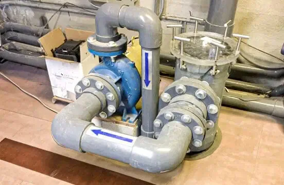 A room with pipes and pipes on the floor, performing essential maintenance services.